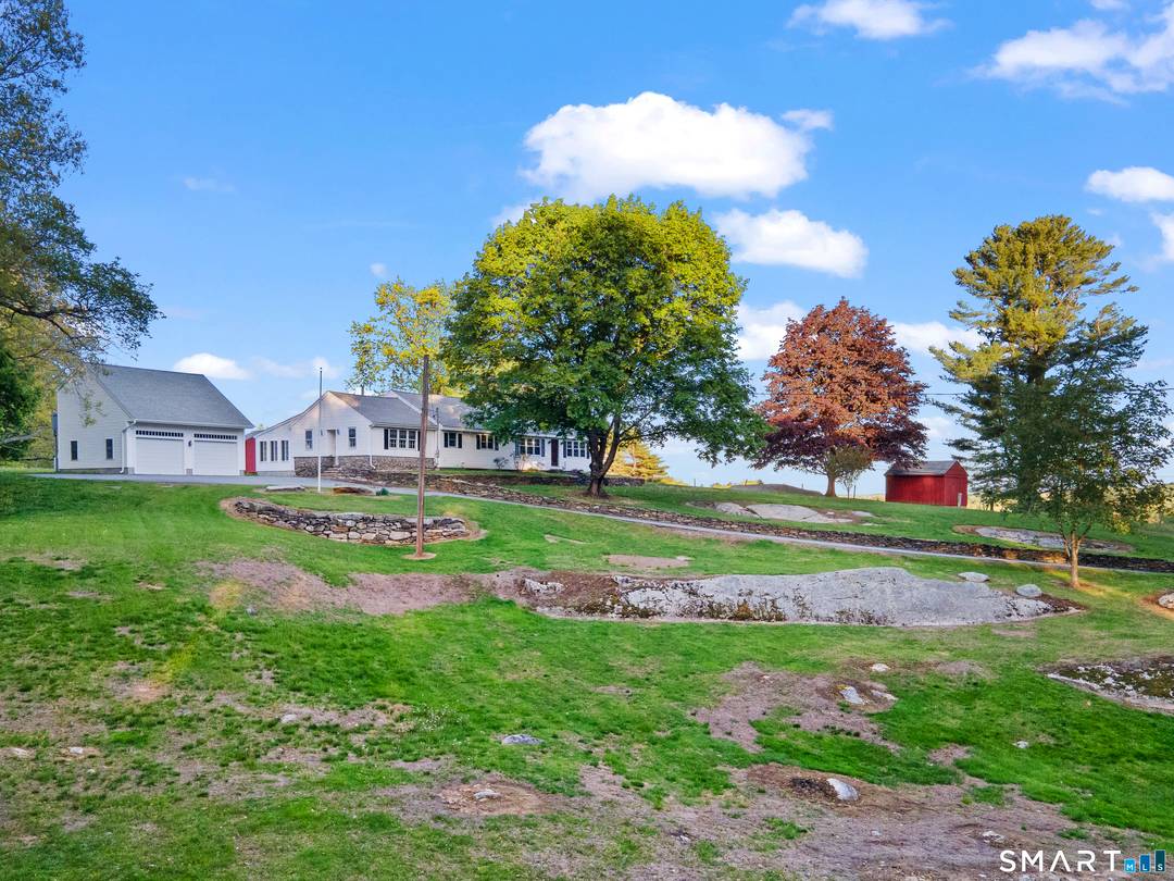 Perched on a hilltop in Woodstock, admired for decades for those who drove past on scenic Route 169, this single owner home is being offered for the first time.