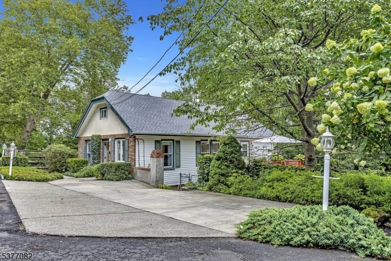 Rare Opportunity for Single family living with work in double garage and lube kit making an ideal hobby shop.