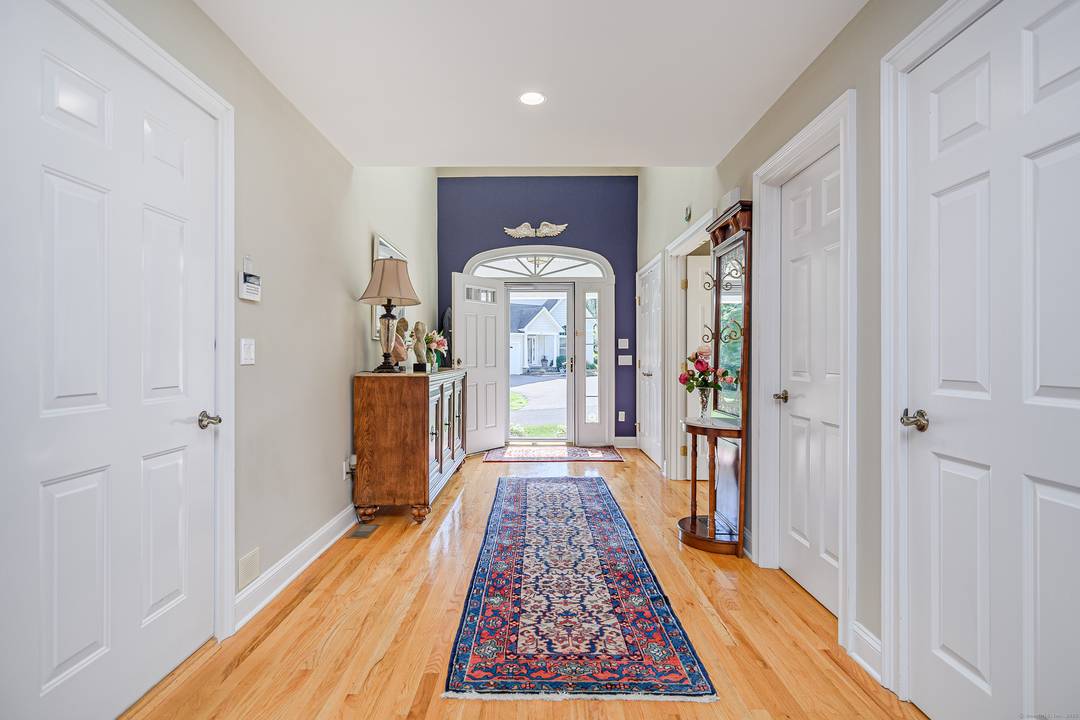 Tucked away on a peaceful cul de sac is a spacious and beautifully appointed 55 community home offering 4, 023 square feet with 3 levels of luxury finished space.