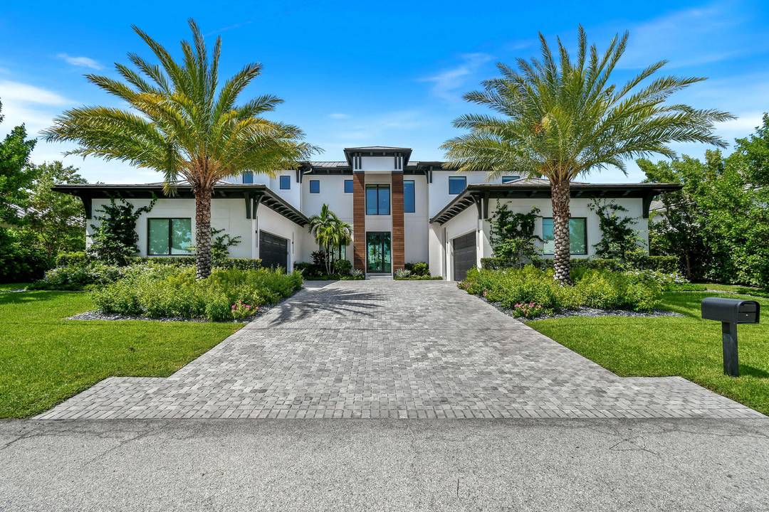 Experience the ultimate in coastal living with this custom built residence, perfectly situated on a deep water canal with 100 feet of waterfront and direct ocean access.