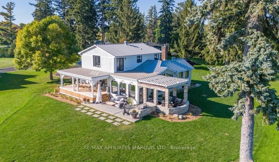 This truly unique residence is set on just under an acre with an impressive 235 feet of pristine shoreline, offering a breathtaking 270 unobstructed view of the St.
