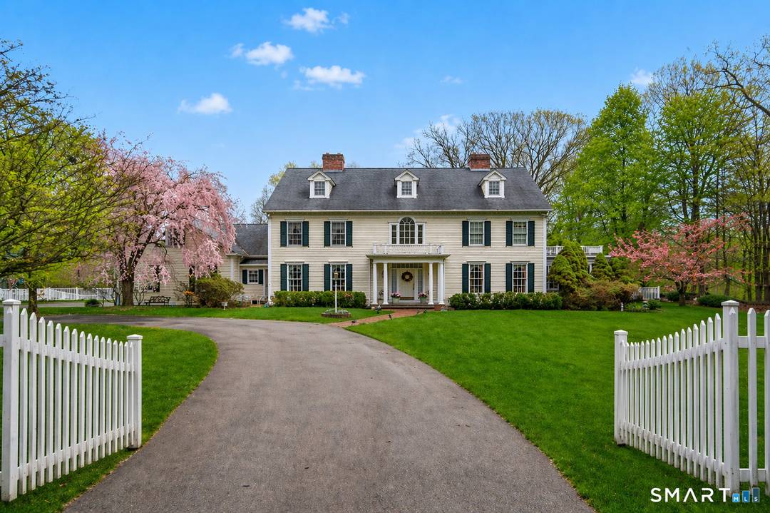 Experience luxury living in this exquisite Garceau built colonial, nestled on a sprawling 2.