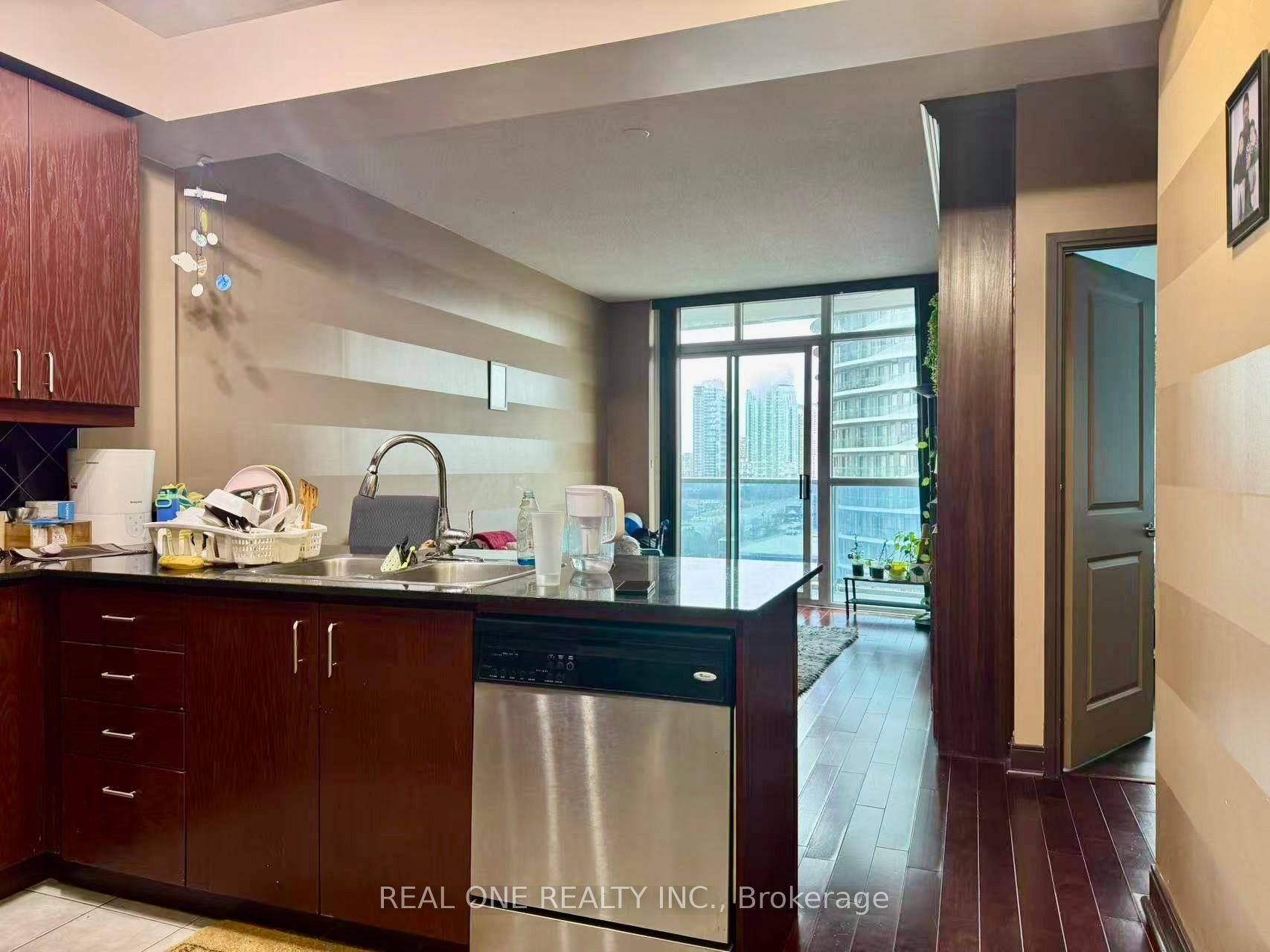 Stunning Spacious Condo Equipped With Custom Built Ins, Fireplace, Hardwood Floors, Oversized Den With French Door amp ; Custom Shelves.