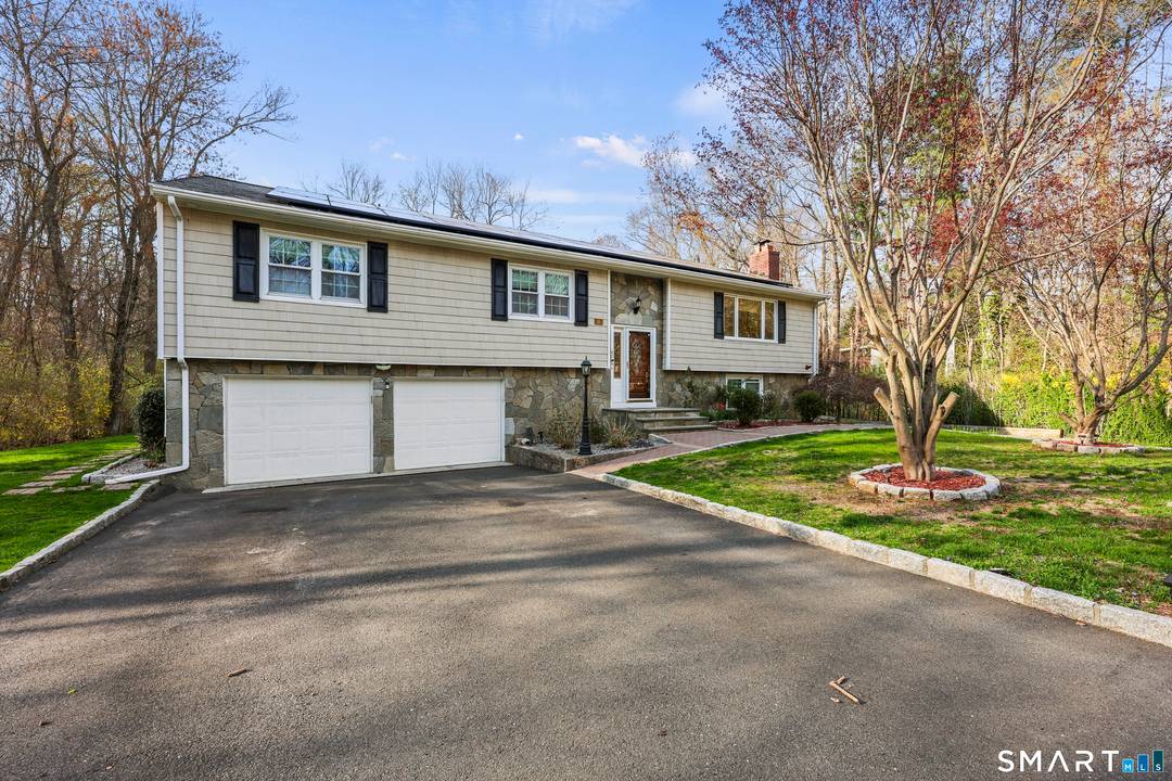 Nestled in one of Monroe's most desirable neighborhoods, this beautifully maintained raised ranch offers the perfect blend of comfort, style, and privacy.