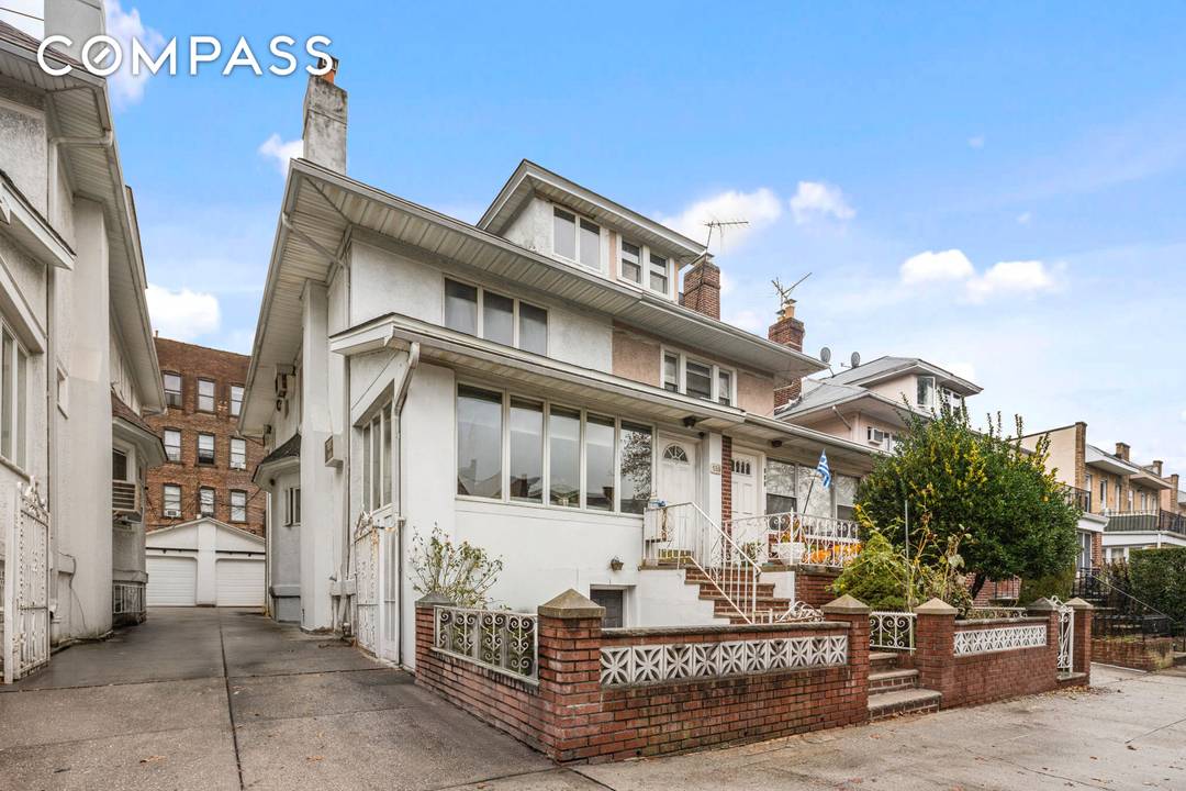 Welcome to this Charming Semi Attached Two Family Home with Garage, Shared Drive, and with great Indoor Outdoor Living.