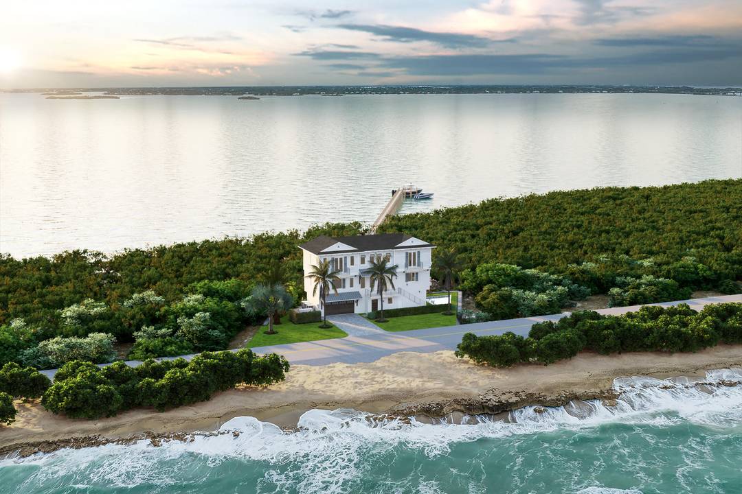 Spanning over an acre, this exceptional property offers approximately 275 feet of combined water frontage, stretching from ocean to river.