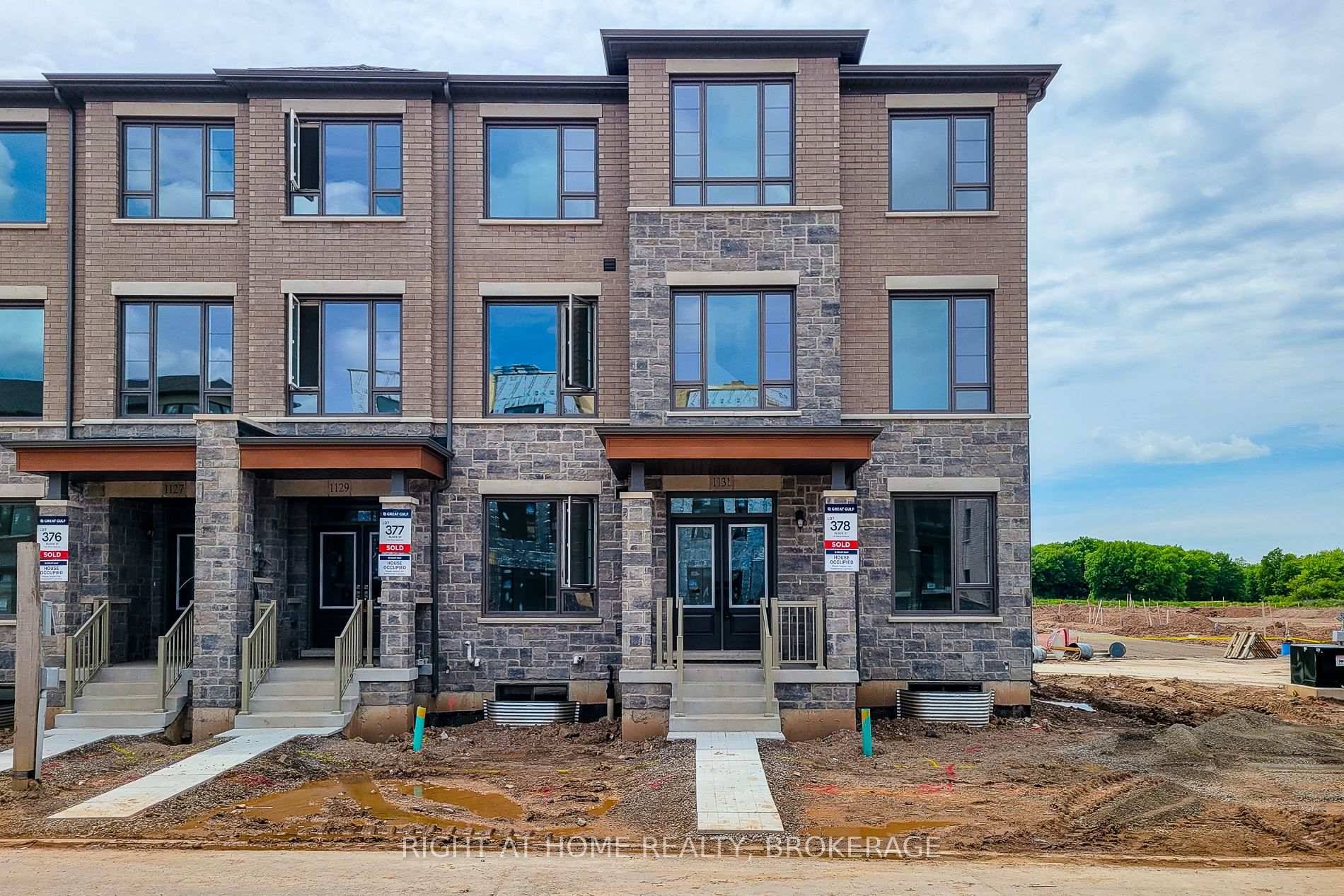 Introducing a Brand new 5 bedroom, 5 bathroom Executive rear lane townhouse by Great Gulf, nestled in the prestigious Upper Joshua Creek community.