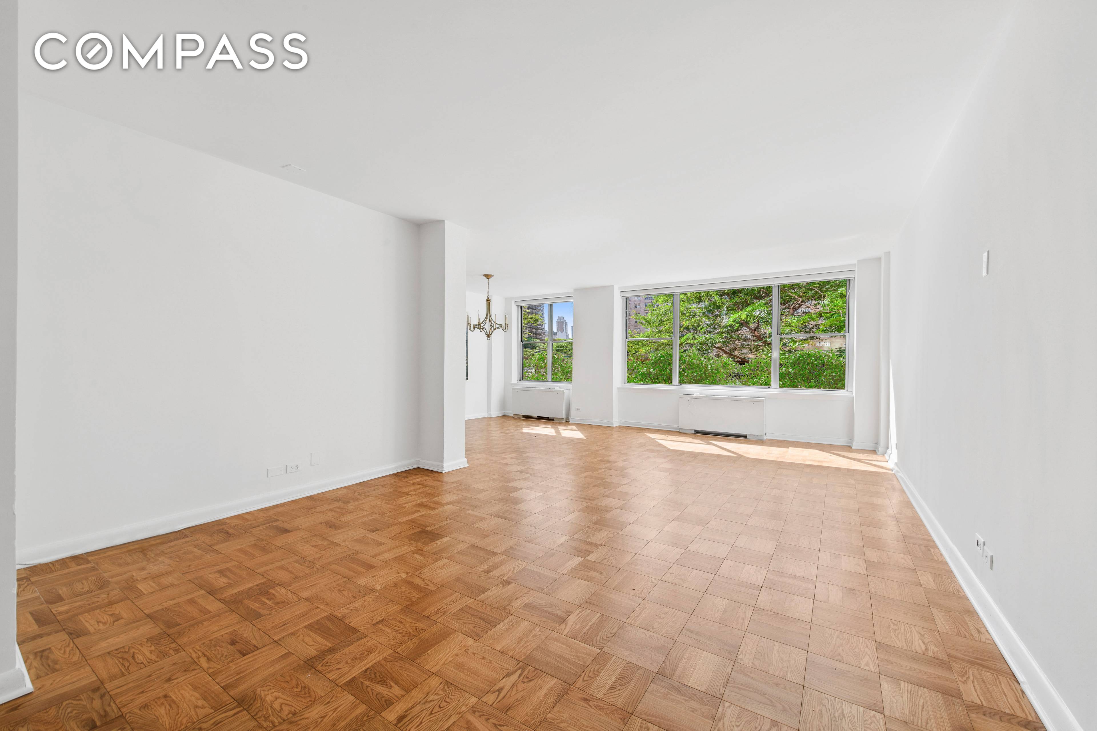Welcome to apartment 2C at 201 E 62nd, a stunning two bedroom, two and a half bath residence located within an elegant white glove cooperative in the heart of the ...