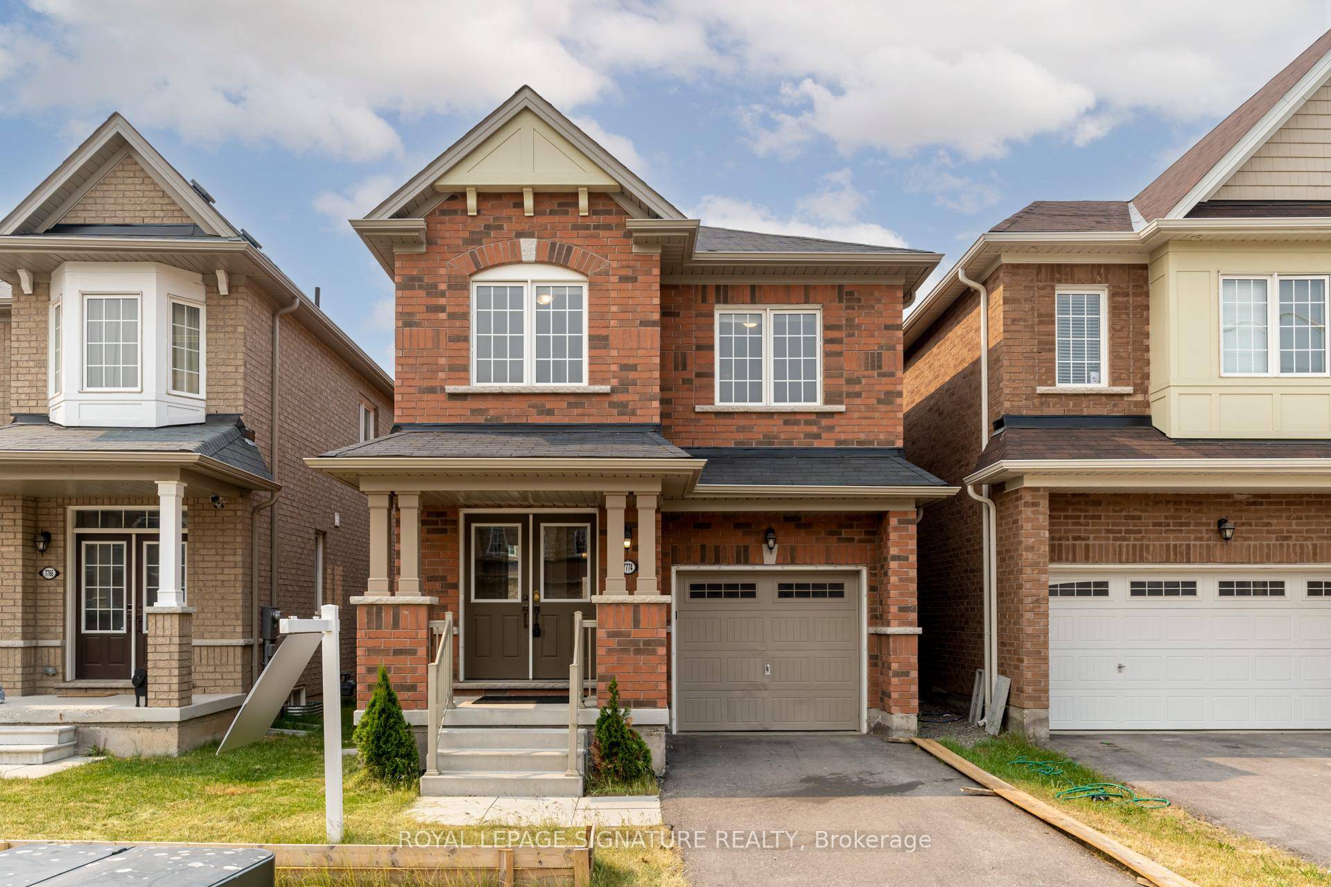 Ravishing Red Brick Detach with an excellent Curb Appeal built by Empire communities.