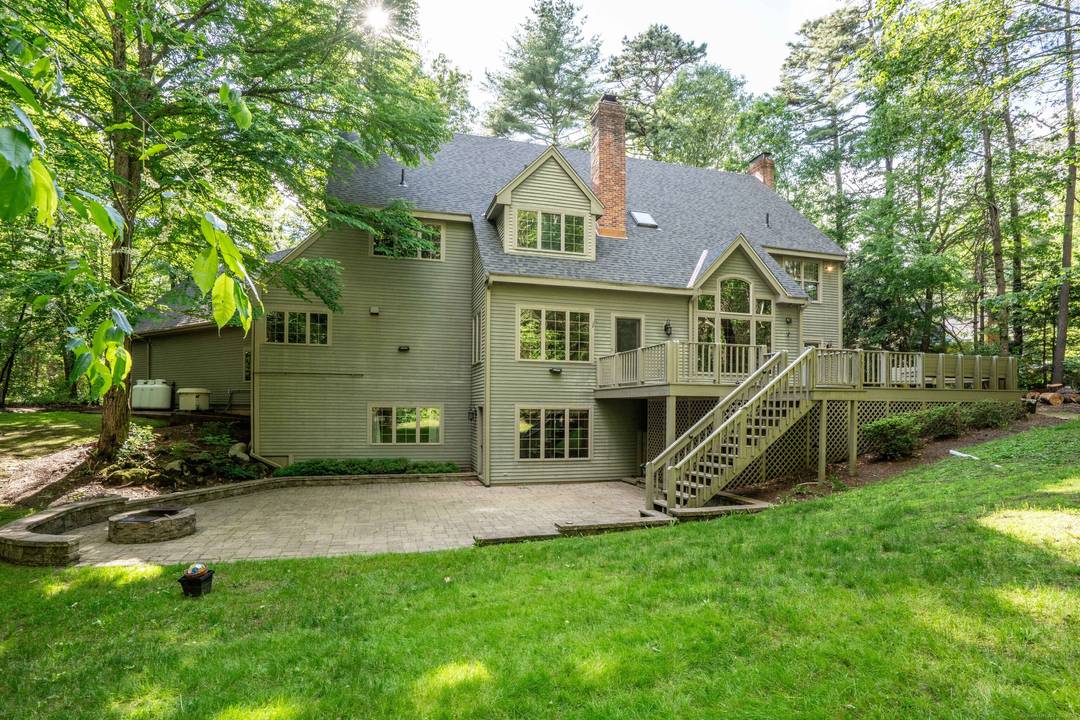 This spacious home is beautifully situated at the end of a cul de sac in the popular Devonwood neighborhood of Farmington.