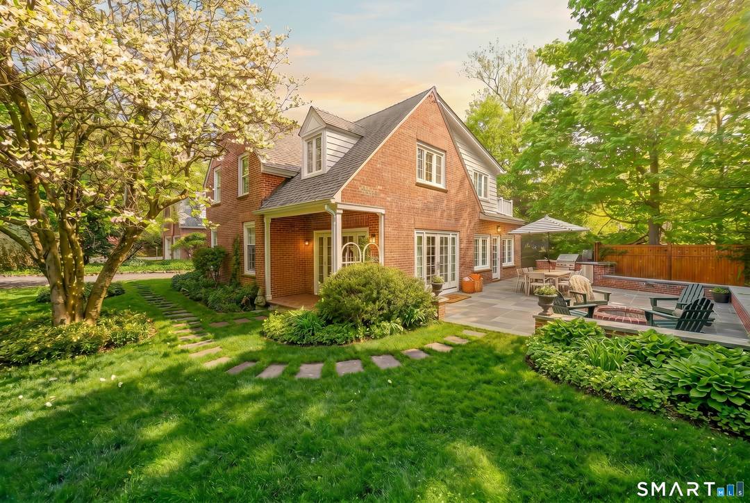 Timeless elegance meets modern comfort in this stunning 1936 brick Colonial, beautifully updated while preserving the warmth, character, and craftsmanship of its vintage roots.