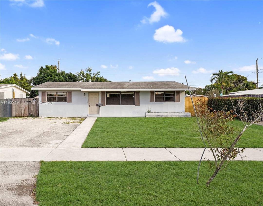 Spacious single family home with no HOA featuring 4 bedrooms and 2 bathrooms on a large lot with front and back yards perfect for adding a pool.