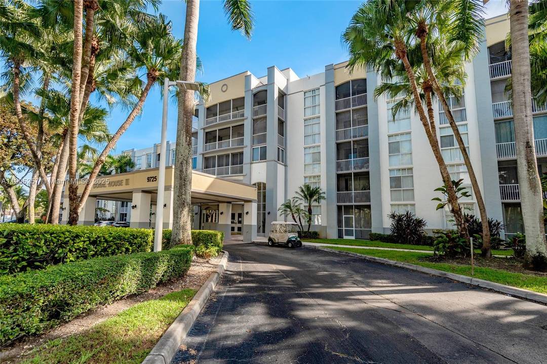 Stunning Doral condo. Beautiful, remodeled open style white kitchen, s s appliances wine fridge.