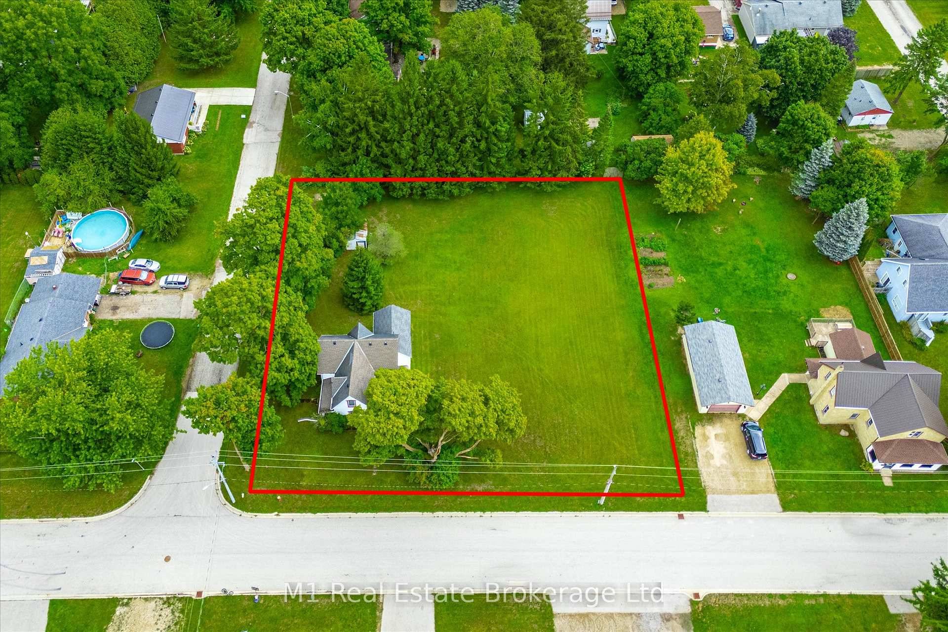 With 165 feet of frontage on two streets, this corner lot in Clifford offers a rare chance to consider future severance and development right in town.