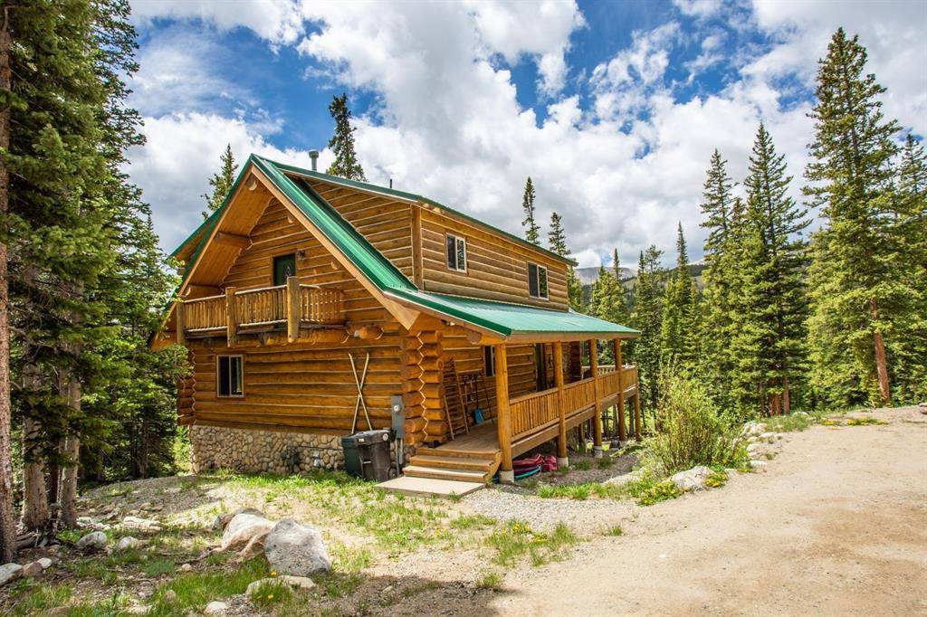 Simply charming w genuine giant logs accented by gorgeous rockwork, only some of the wonderful qualities.