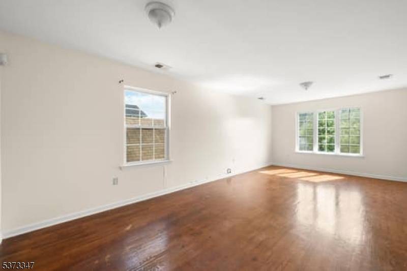 Welcome to this well maintained two family residence, an excellent opportunity for both comfortable living and investment potential.