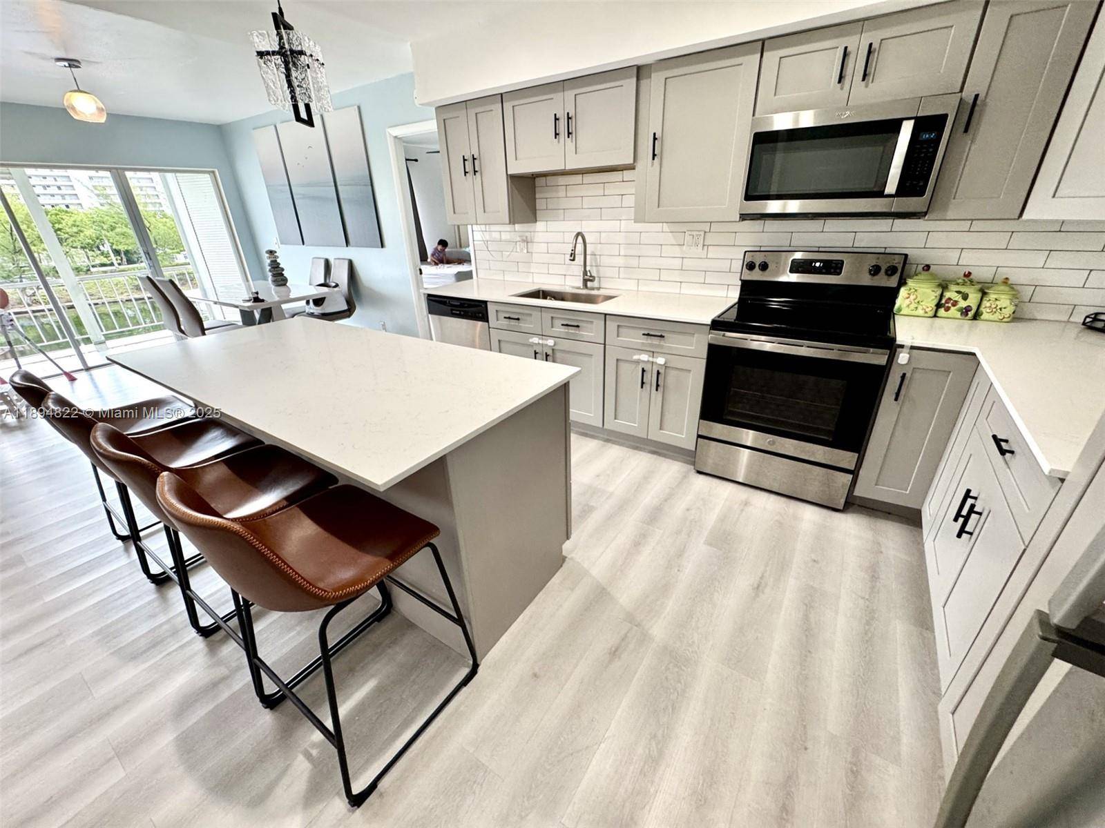 Experience luxury living at its finest in this beautifully remodeled residence offering breathtaking panoramic views of the Intracoastal.