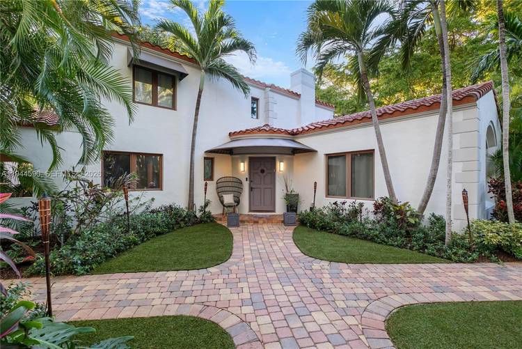 Tucked away on a quiet residential street in the coveted Flamingo Drive neighborhood, this classic Miami Beach home offers a rare blend of privacy, architectural character, and an exceptional walk ...