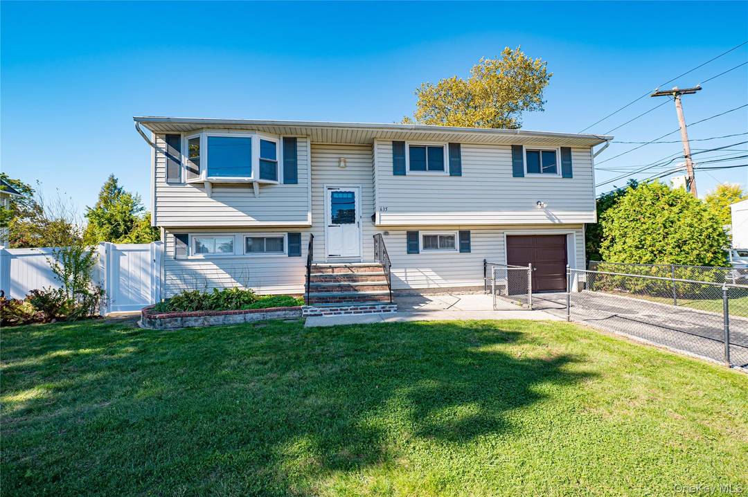 Live in one half and rent out the other !