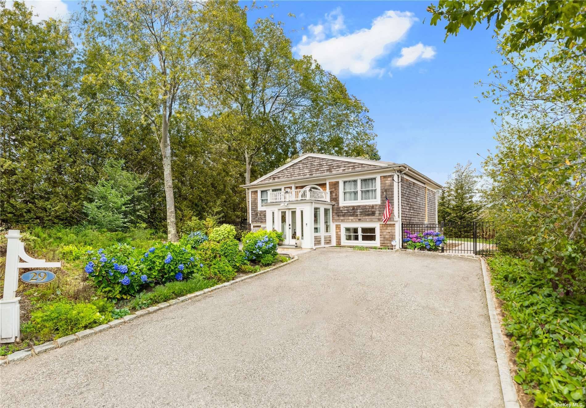 Immerse yourself in the quintessential Southampton lifestyle with this impeccably maintained 4 bedroom, 2 bathroom home boasting exclusive access to Big Fresh Pond !
