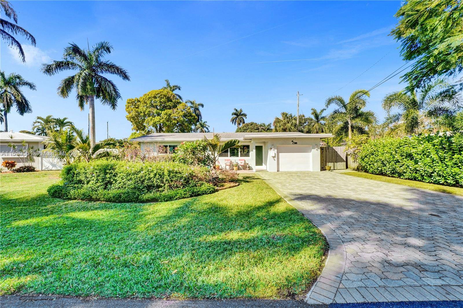 Exceptionally redone Wilton Manors pool home with 2 bedrooms 2 full baths pool accessible den office guest room.