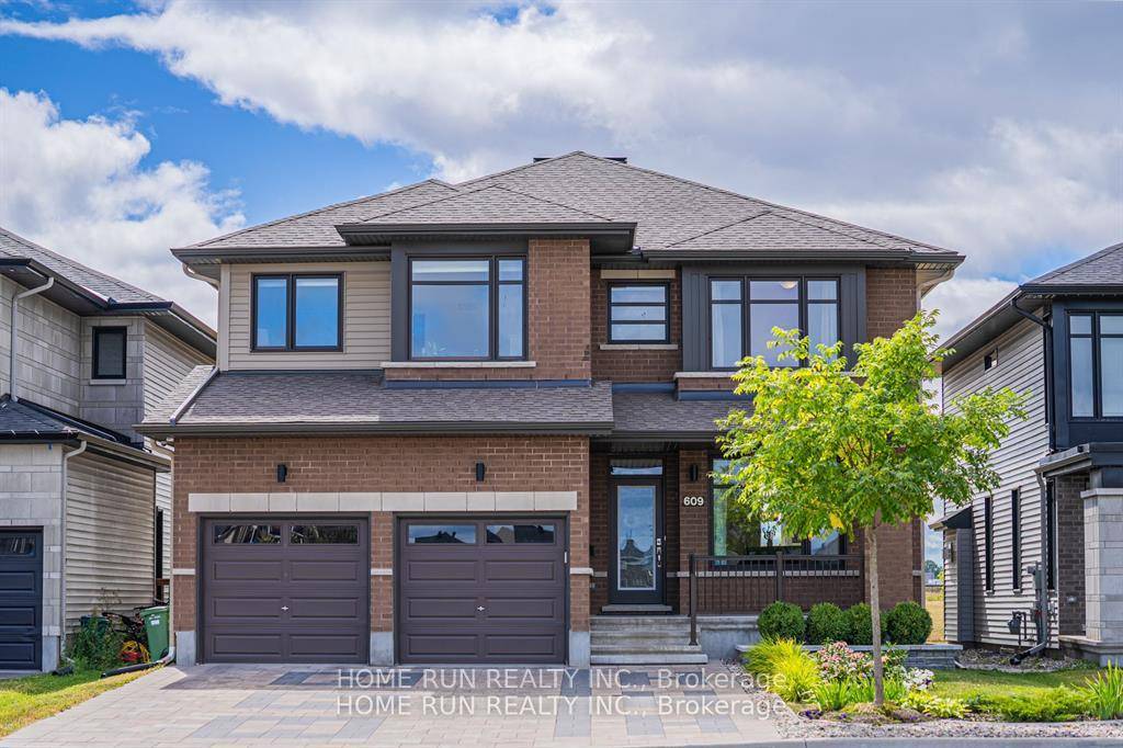 NO Rear Neighbors ! This stunning Millwood model, built by Richcraft Homes in 2020, offers 6 bedrooms and 5 full baths spread across three floors.