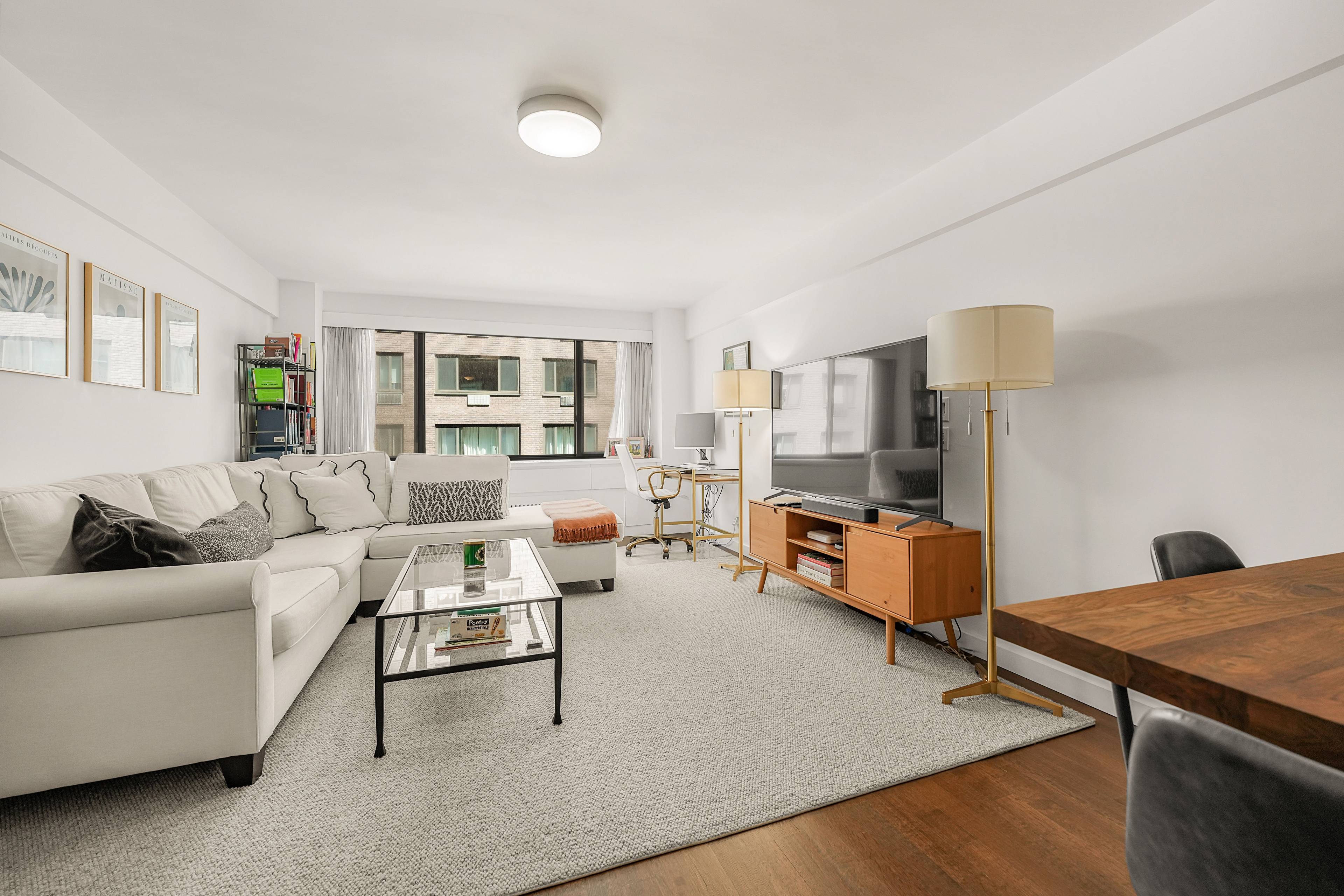 This bright and airy north facing unit showcases a thoughtfully refined layout with sophisticated high end finishes throughout.