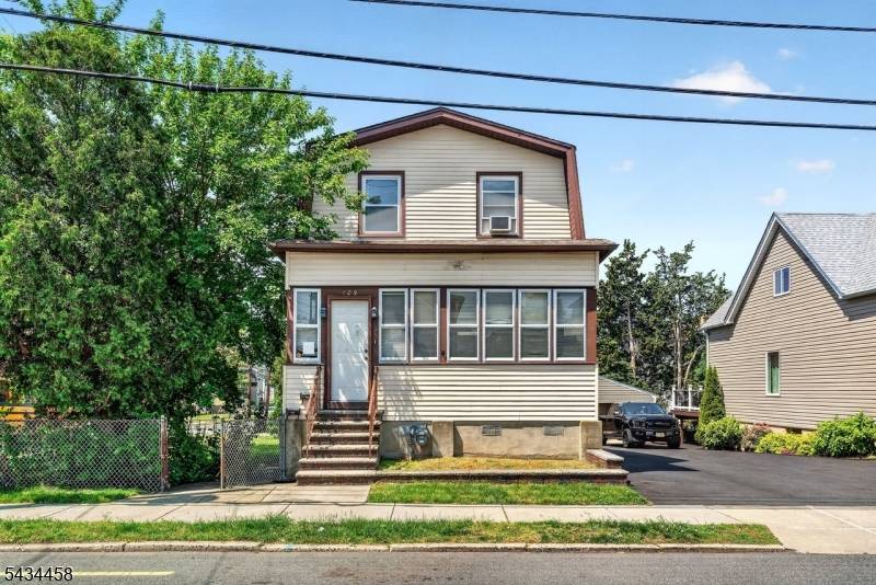 HOTTEST 2 Family home on the Market located in the heart of vibrant DOWNTOWN GARFIELD offering a RARE OPPORTUNITY FOR BOTH OWNER OCCUPANTS INVESTORS just 18 miles to NYC !