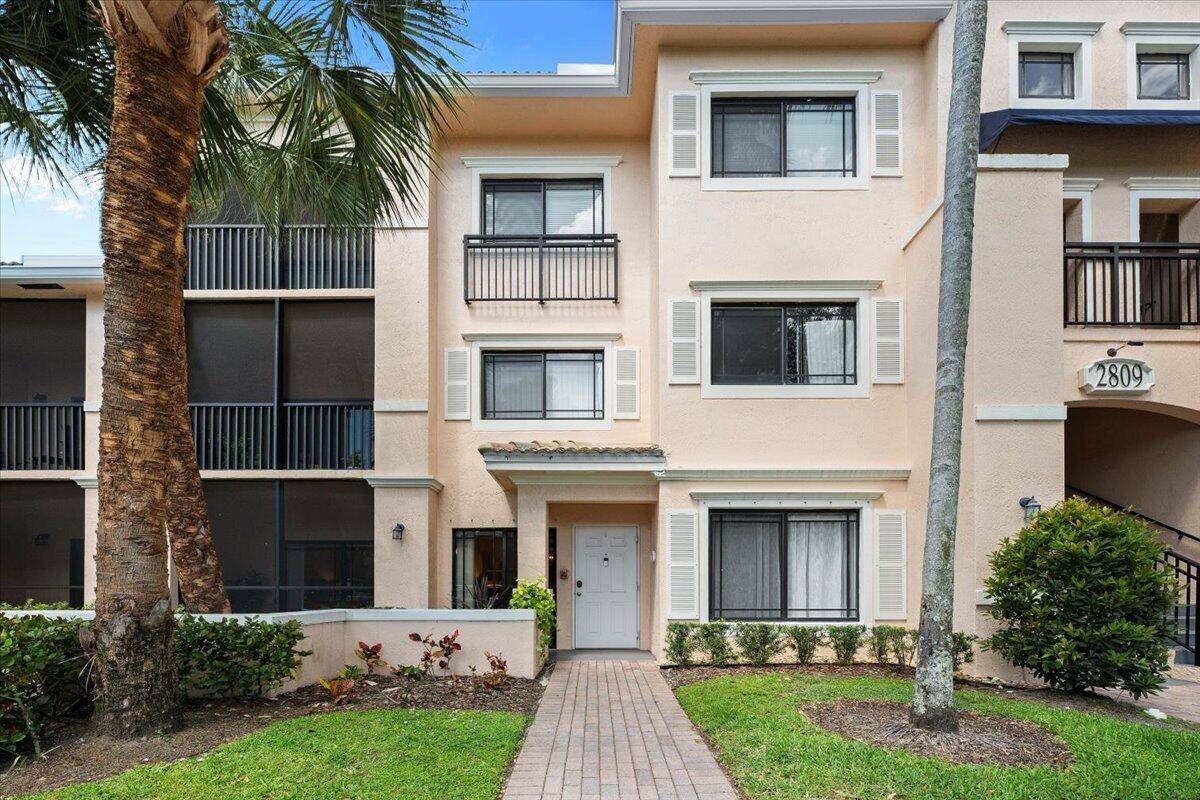 Beautifully updated 2 bed, 2 bath ground floor condo in sought after San Matera !