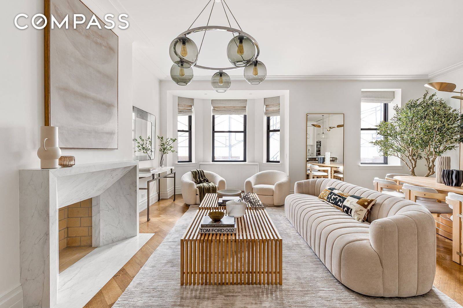 Welcome to Unit 705, a corner residence with a breathtaking, sun filled great room framed by a south facing bay window and a working wood burning fireplace.