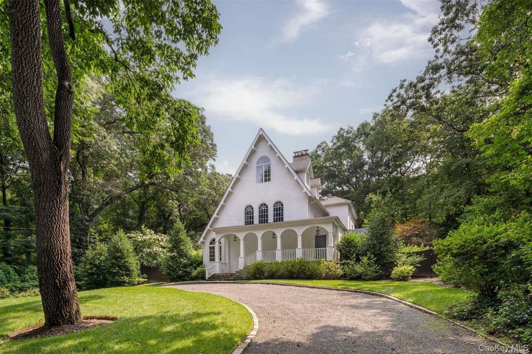 Set on a deep two acre parcel, this bespoke, reimagined property is enhanced by new landscaping and mature trees, offering a private and tranquil setting.