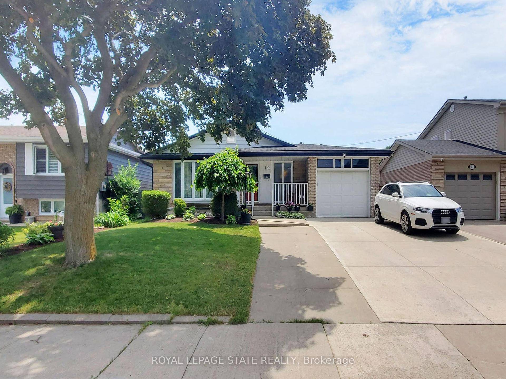 Lovingly maintained bungalow with full in law suite and walk out basement.