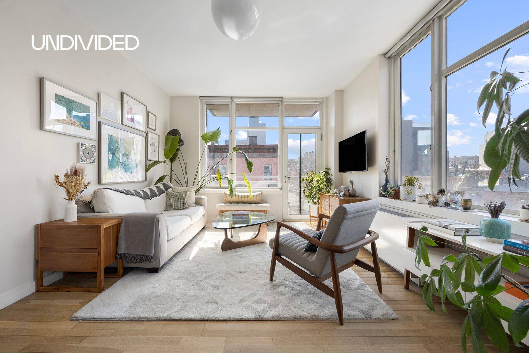 Welcome to 1 Powers Street, Unit 306, a beautifully designed corner two bedroom, two bathroom residence in the heart of Williamsburg.