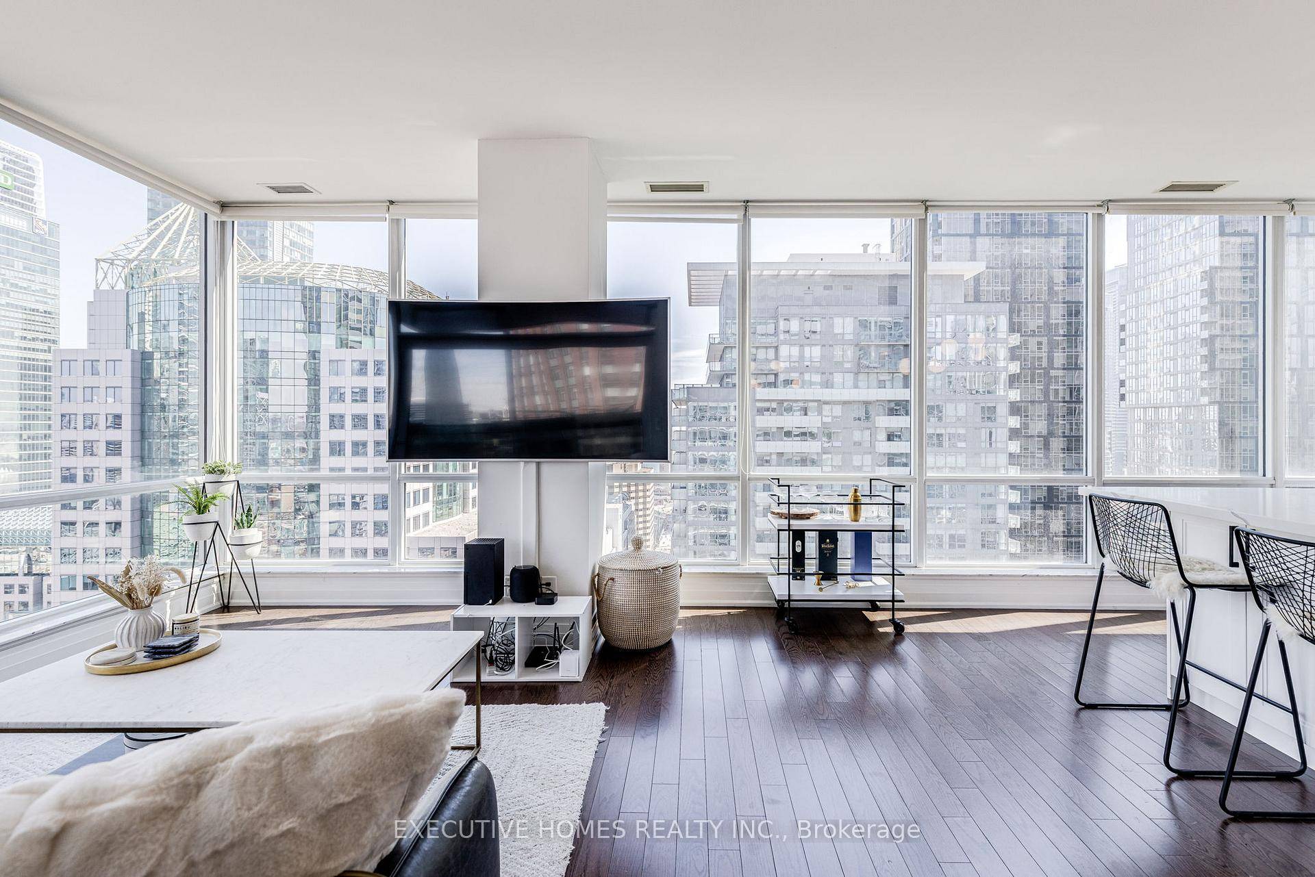 Bathed in the gentle southeast light that only a high corner suite can claim, Festival Towers Suite 2912 feels less like a condo and more like a private observatory above ...