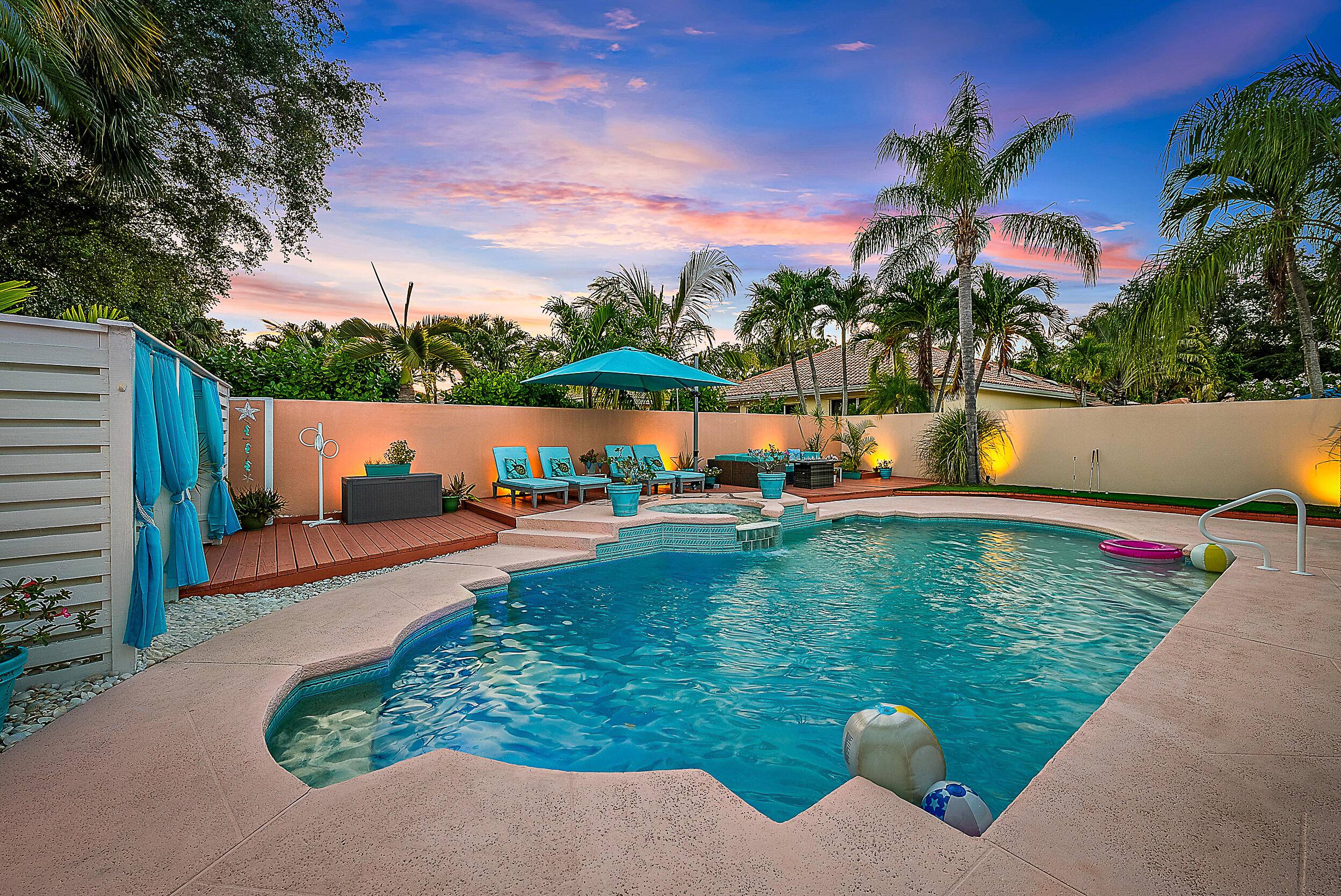 Welcome to your Florida dream home in the highly desirable, family friendly community of The Hamptons at Maplewood in Jupiter.