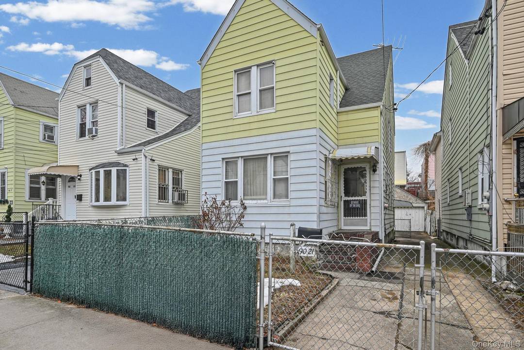 Warm and inviting detached single family home in the heart of Hollis, close to Hillside Ave.