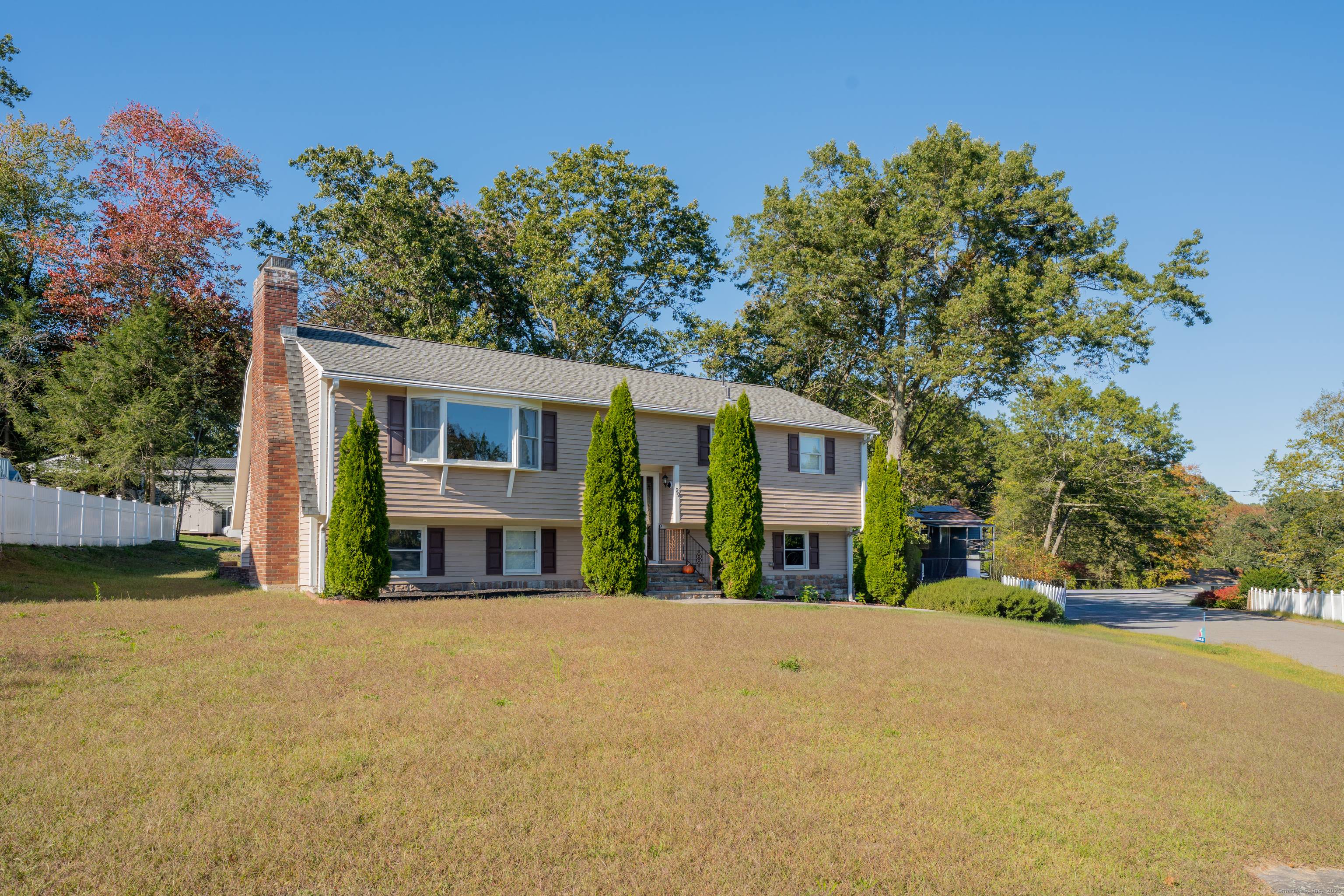 Beautiful high raise ranch, three bedrooms on mail level, living room, dining room, and spacious kitchen.