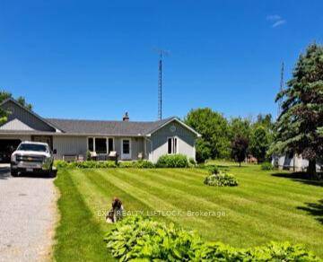 A Home With A Heart ! Cavan Country bungalow on large level lot with impressive views of the rolling hillsides.