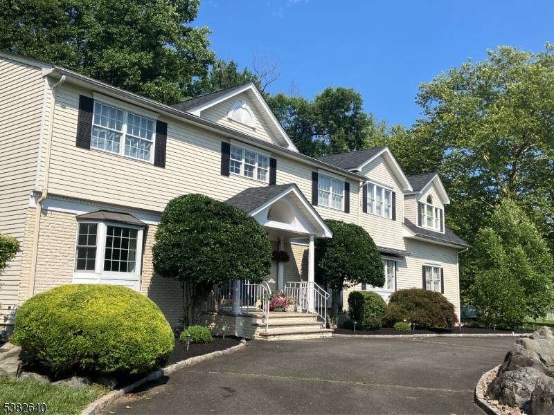 On the most picturesque street only a few minute walk to Ponderosa Park, preserved land, a bus to NYC this private central location is perfect for the active family.