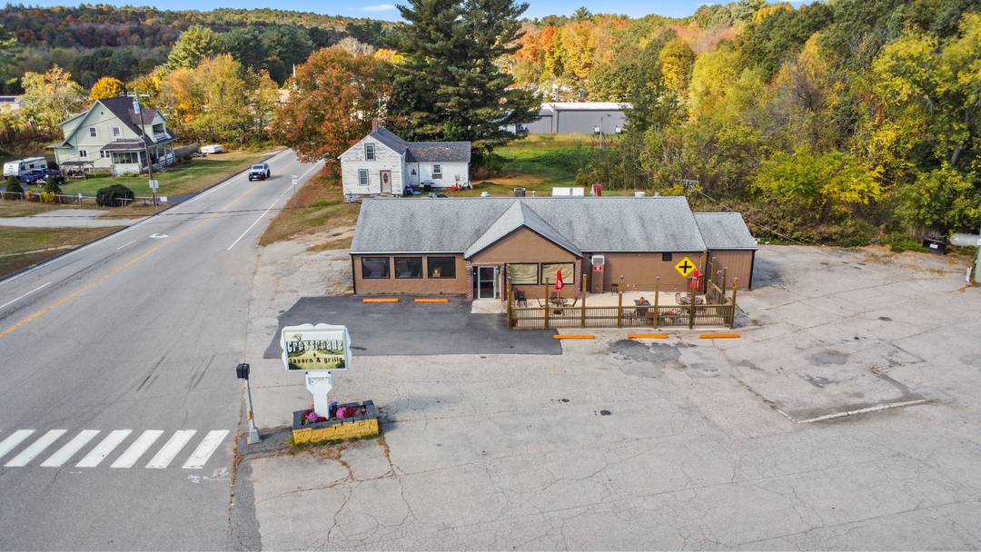 Own a local landmark, a freestanding 2, 324 SF restaurant bar and 600 SF storage building in Thompson, CT, zoned for commercial use.