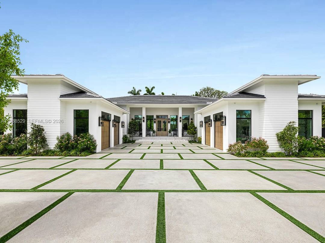 Welcome to a newly constructed 2026 modern estate set along the iconic, tree lined Old Cutler Road.