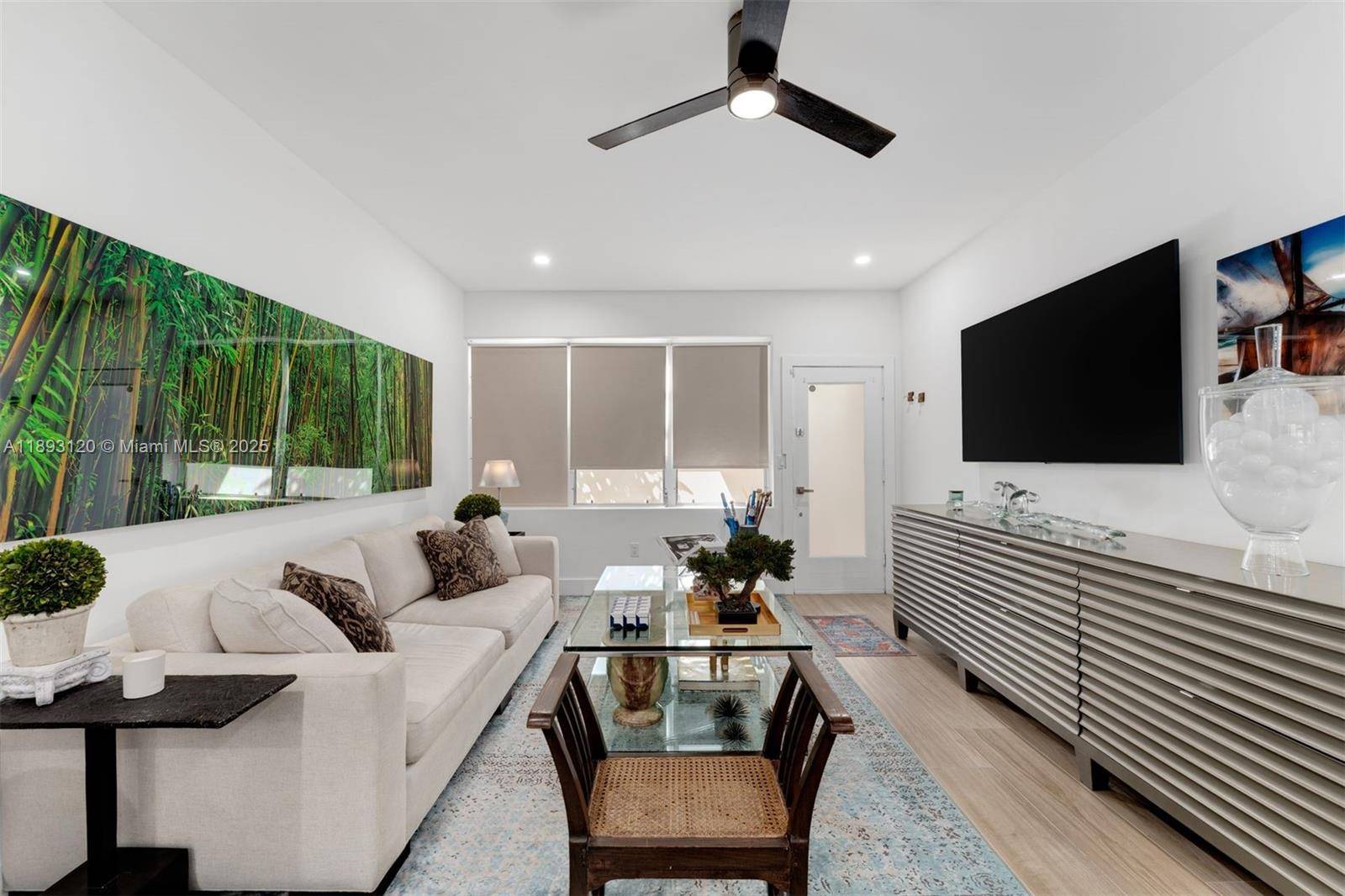Completely remodeled residence at Esquire House located on prestigious Pine Tree Drive and surrounded by multimillion dollar homes.