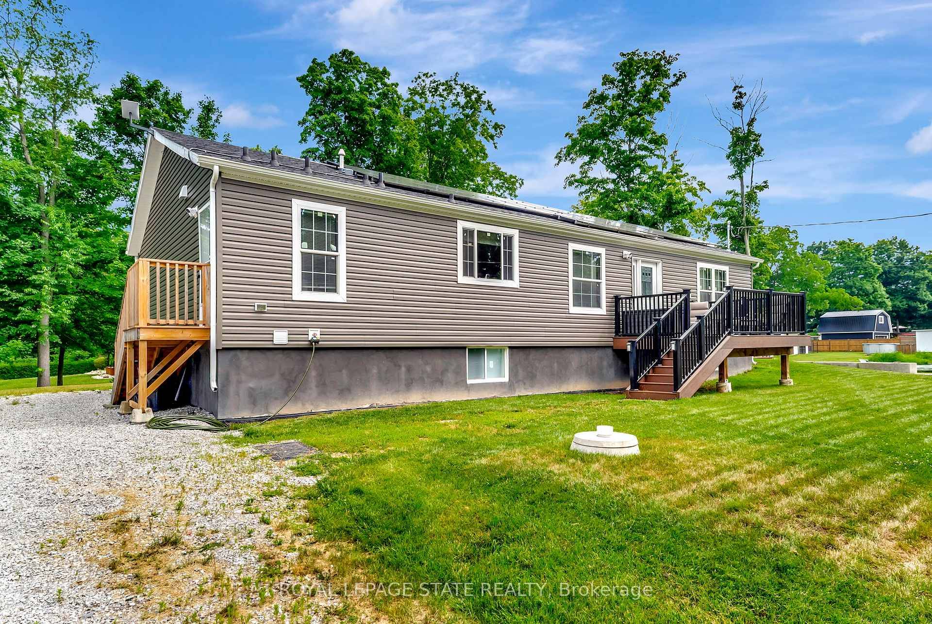 This stunning, nearly new cottage, built in 2021, offers over 3, 000 sq ft of living space.