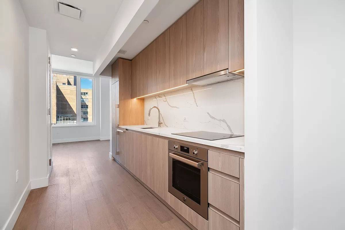 Boasting 10. 5 ft ceilings and wide plank wooden flooring, 17D offers open double exposure North and West, airy layouts, and the highest quality fixtures and finishes throughout.