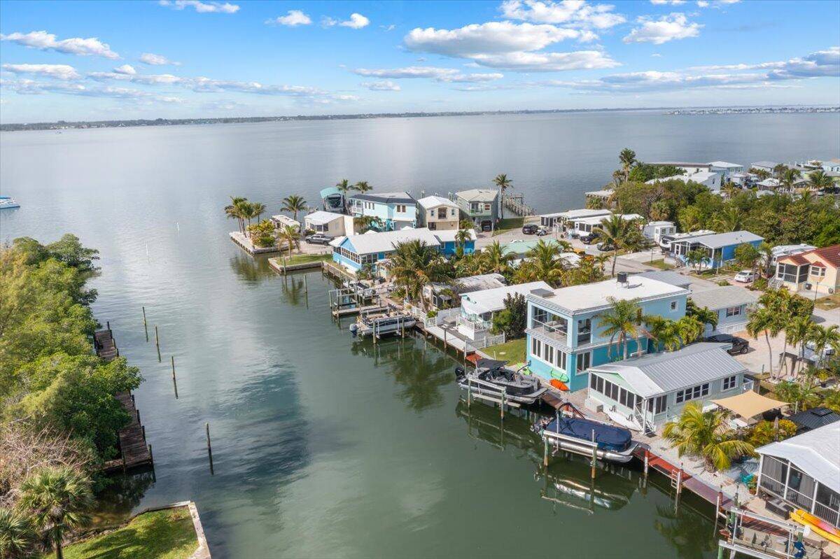 Experience tropical living at its finest in this waterfront oasis, built in 2015.