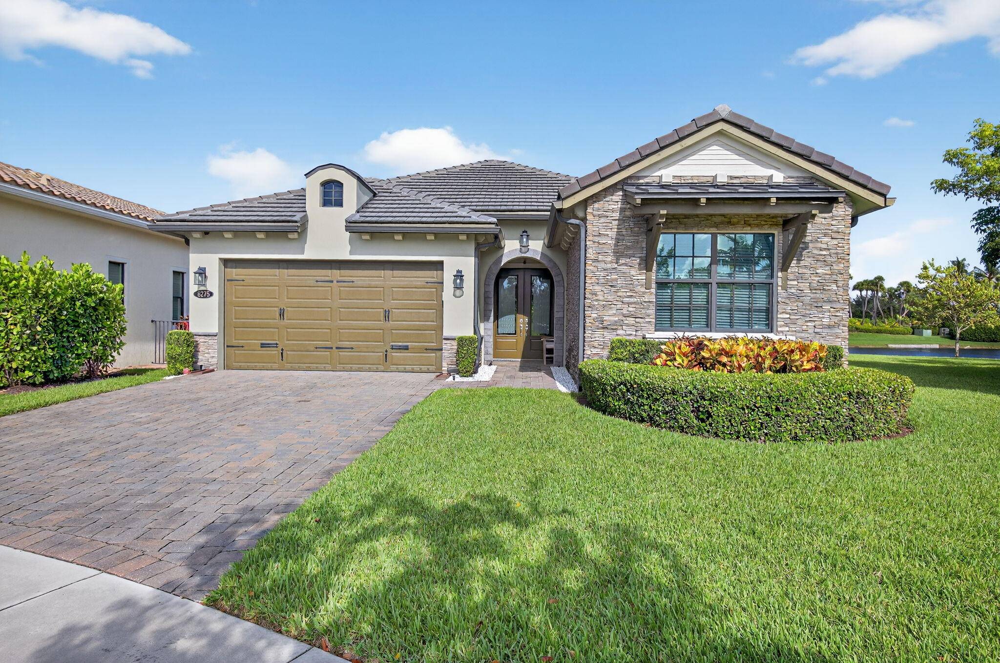 ONE OF THE BEST LOTS IN PALM MEADOWS ESTATES WITH APPROX 150 FT OF WATERFRONT.
