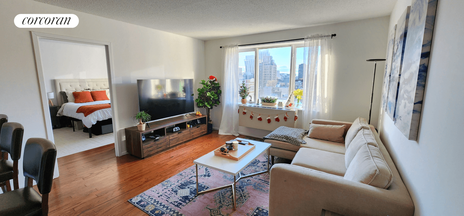 Actual view shown ! Located in Chelsea ; this home is a large true 2 bedroom apartment with 2 full bathrooms situated in a 24 hour attended lobby building with ...
