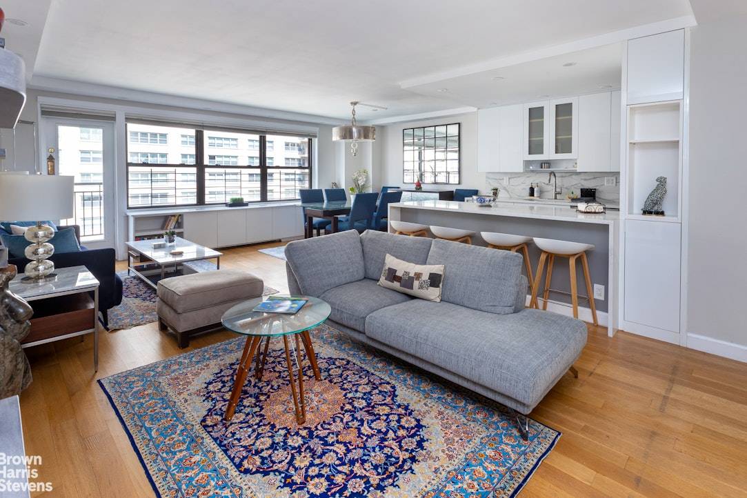 Spectacular Renovated 5 Room Home with Office Media Room This stunning high floor corner residence offers open city and river views along with a spacious balcony for indoor outdoor living.