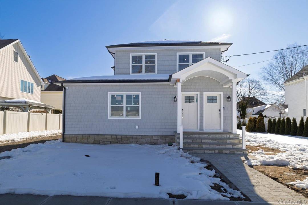 Welcome to 8 1st Street, a beautifully renovated residence providing modern comfort and elevated design in the heart of Lynbrook.