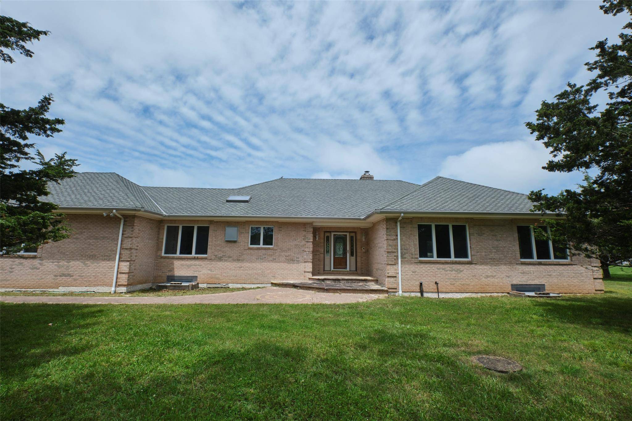 Custom built Ranch Situated on an Expansive 40, 152 sq ft lot Just Blocks from the Beach !